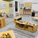 Photo of downtown preschool classroom, with preschool furniture and toys