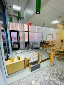 Photo of downtown preschool classroom, with preschool furniture and toys
