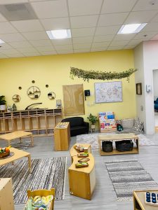 Photo of downtown preschool classroom, with preschool furniture and toys