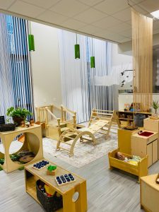 Photo of downtown preschool classroom, with preschool furniture and toys