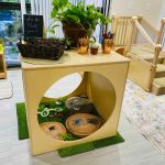 Photo of downtown preschool classroom, with preschool furniture and toys