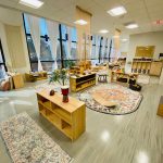 Photo of downtown preschool classroom, with preschool furniture and toys