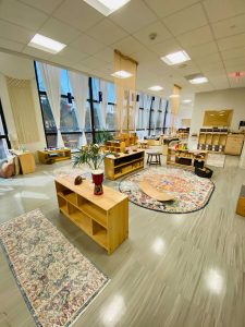 Photo of downtown preschool classroom, with preschool furniture and toys