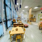 Photo of downtown preschool classroom, with preschool furniture and toys