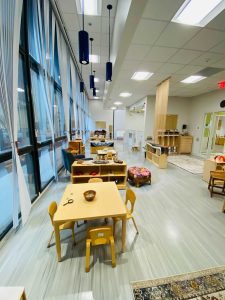 Photo of downtown preschool classroom, with preschool furniture and toys