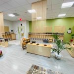 Photo of downtown preschool classroom, with preschool furniture and toys