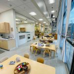 Photo of downtown preschool classroom, with preschool furniture and toys