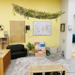 Photo of downtown preschool classroom, with preschool furniture and toys