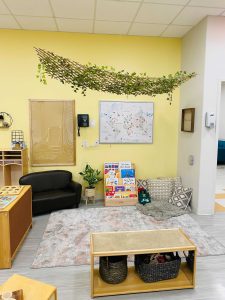 Photo of downtown preschool classroom, with preschool furniture and toys