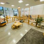Photo of downtown preschool classroom, with preschool furniture and toys