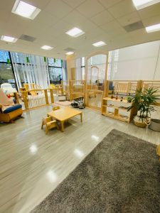 Photo of downtown preschool classroom, with preschool furniture and toys