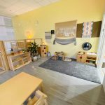 Photo of downtown preschool classroom, with preschool furniture and toys