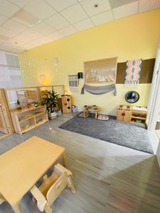 Photo of downtown preschool classroom, with preschool furniture and toys