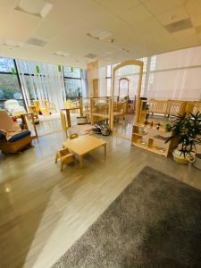 Photo of downtown preschool classroom, with preschool furniture and toys