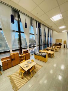 Photo of downtown preschool classroom, with preschool furniture and toys